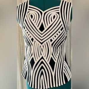 Obstinee sleeveless top.